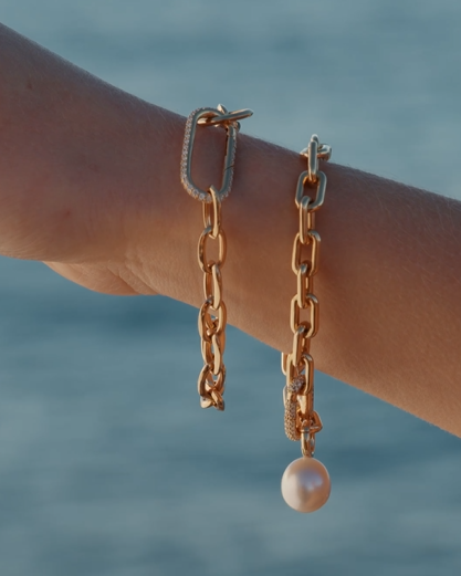 Autore South Sea Pearl on 18kt gold link bracelets on model