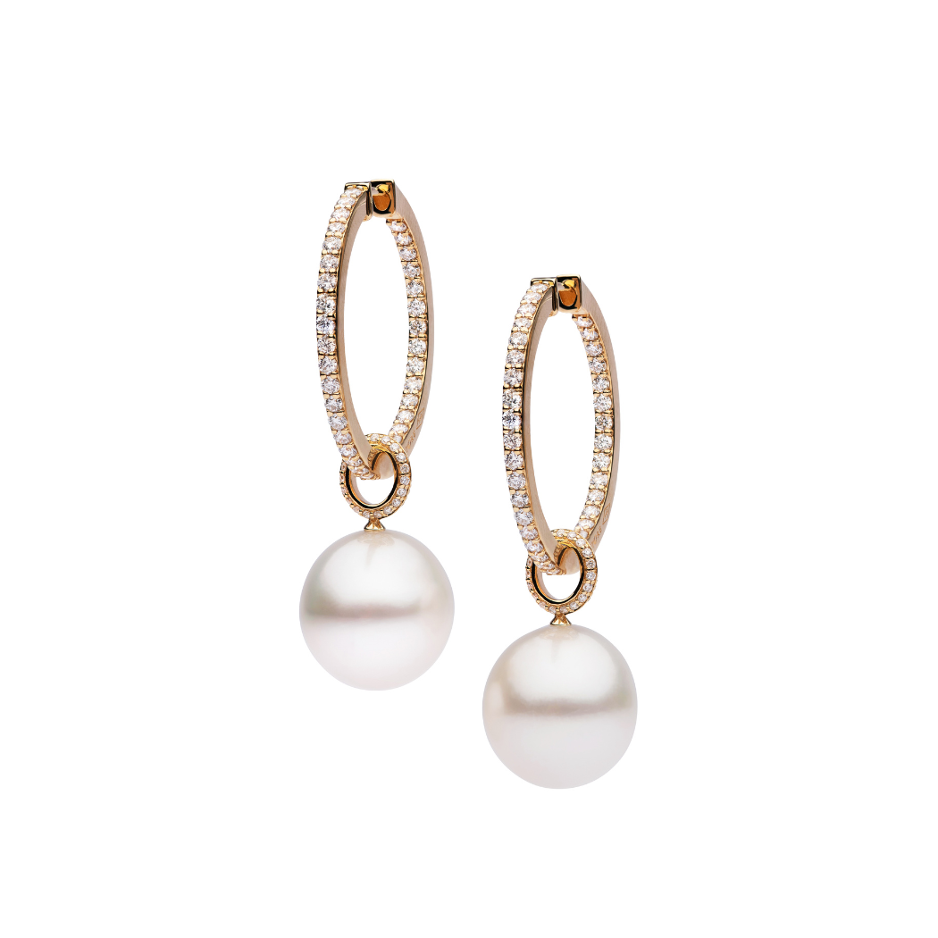 An 18kt yellow gold Autore medium diamond eternity hoop featuring a white South Sea Pearl removable drop