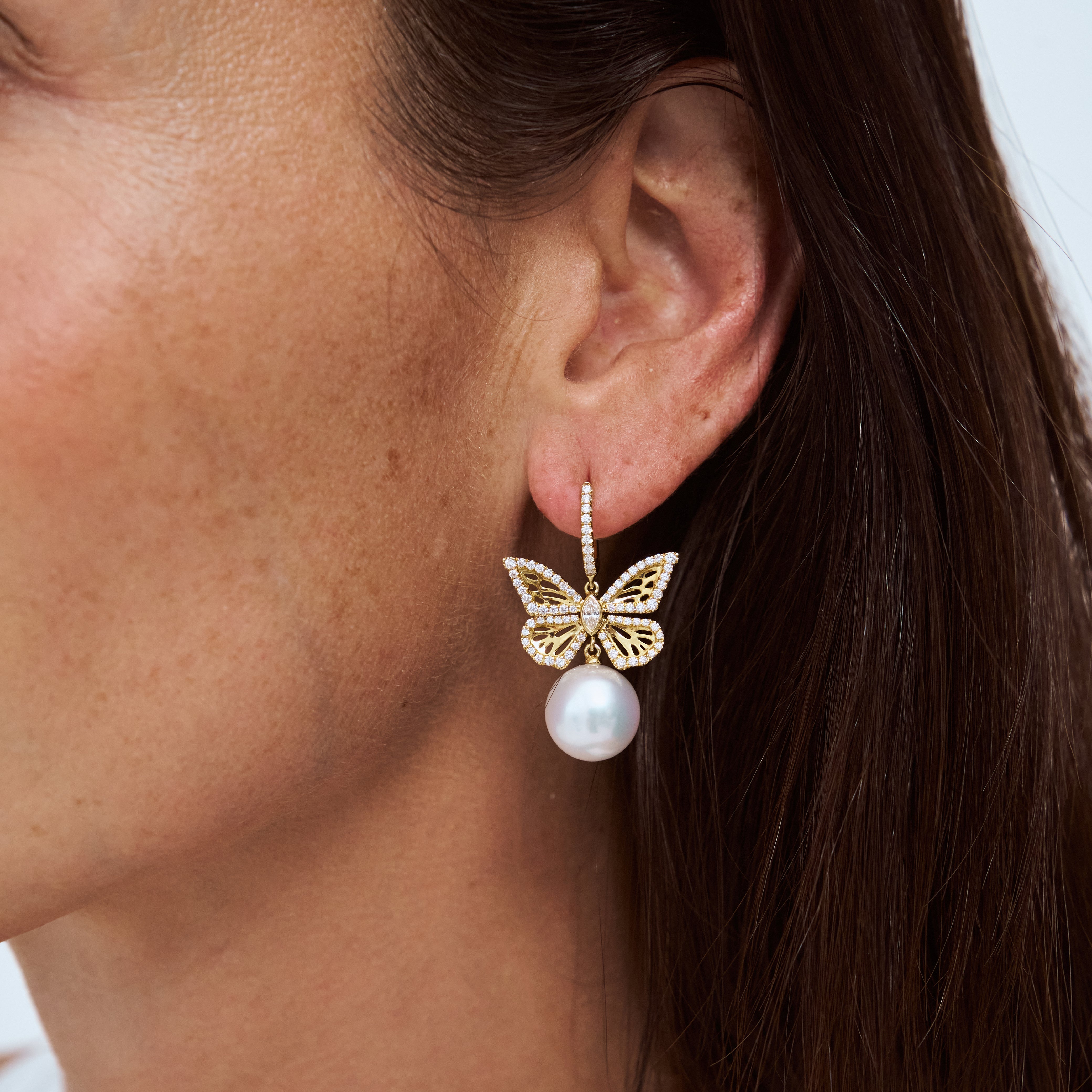 Close-up of Autore South Sea Pearl Papillion Four Wing Huggie Earrings