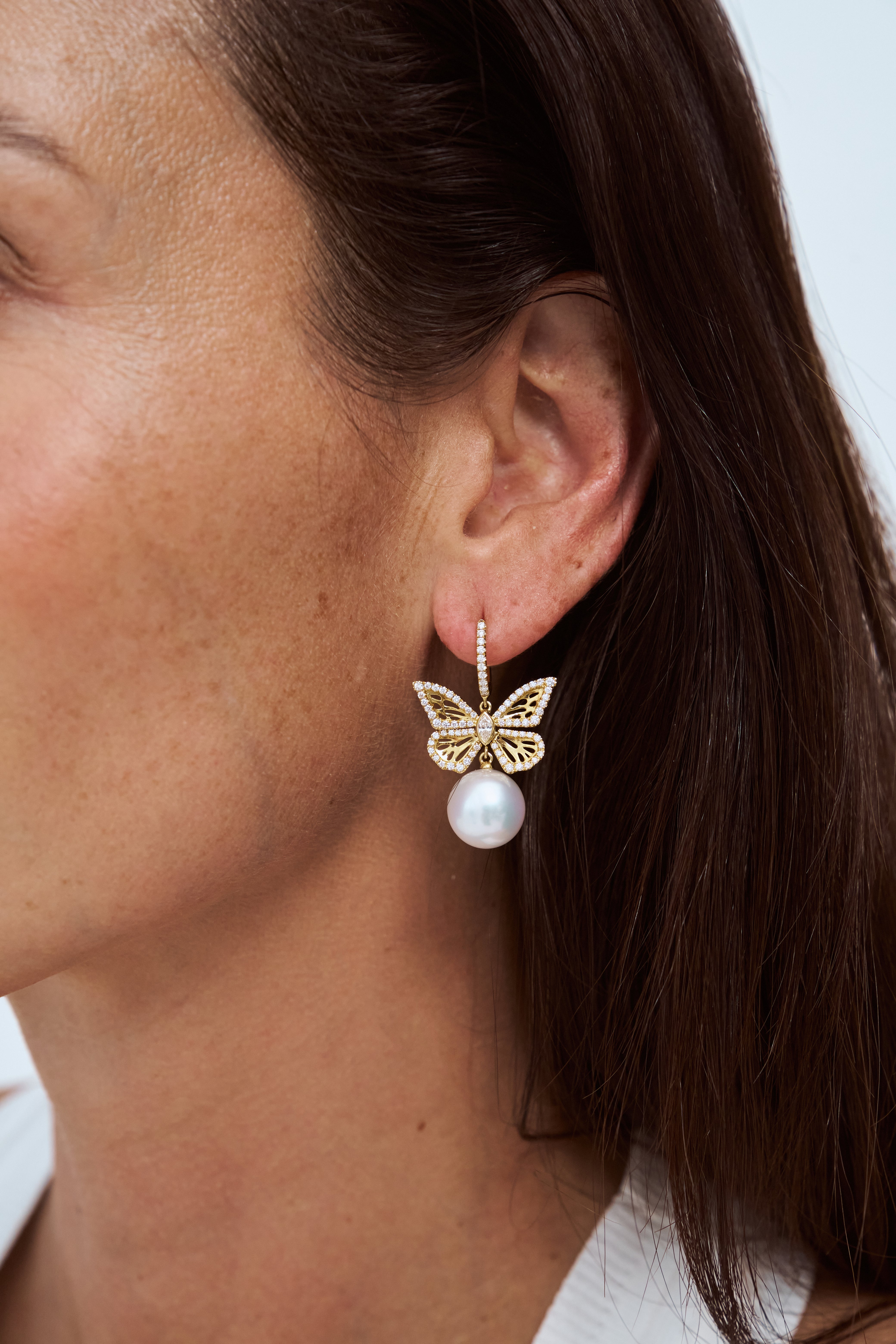 Close-up of Autore South Sea Pearl Papillion Four Wing Huggie Earrings