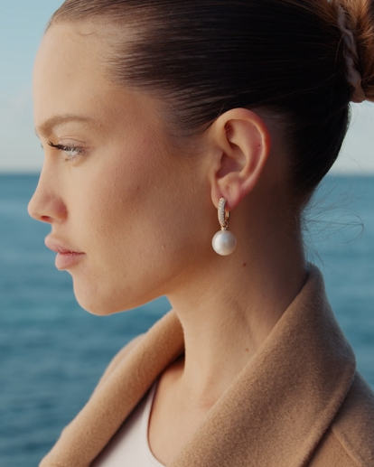 Autore South Sea Pearl on 18kt yellow gold diamond pave earring on model