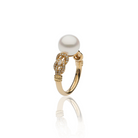 Autore Knot Ring featuring an Australian South Sea Pearl and white diamonds set in 18kt yellow gold