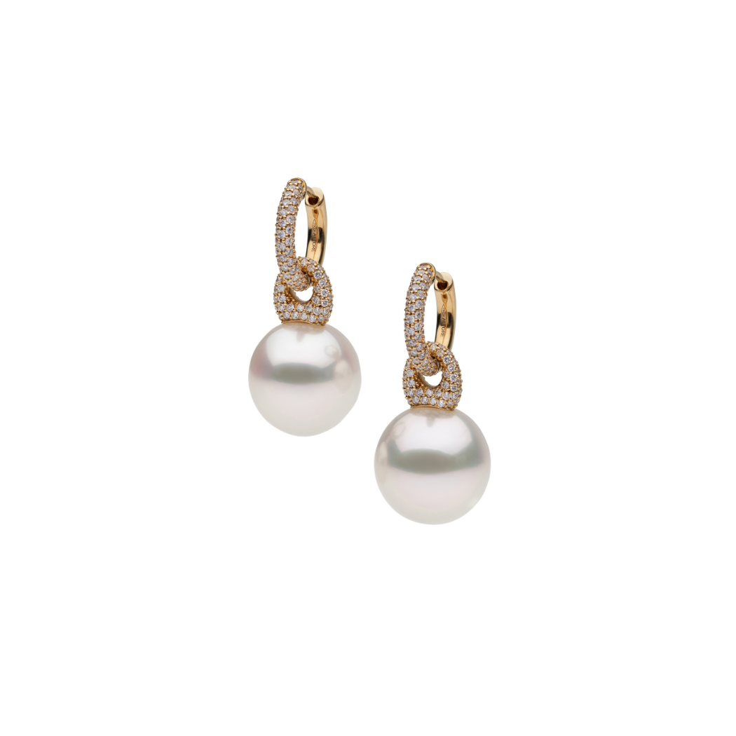 Autore South Sea Pearls set in 18kt yellow gold and white diamond pave link huggie earrings.