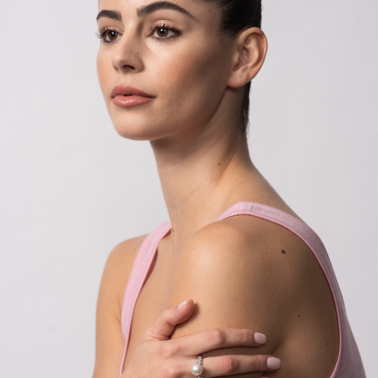 Autore Hercules Knot Ring featuring an Australian South Sea Pearl with white diamonds on model