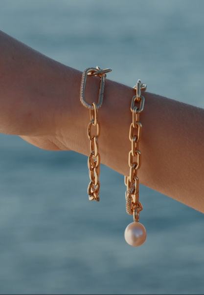Autore South Sea Pearl on 18kt gold link bracelets on model