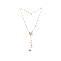Full length view of the Autore Papillon Four Wing Lariat in 18kt yellow gold