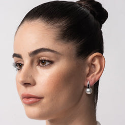 Autore Deco Huggie Earring in Blue Sapphire Australian South Sea Pearl on model