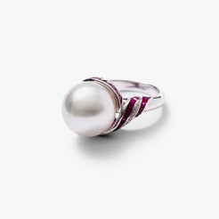 Close-up detail of the Autore South Sea pearl ring in 18kt white gold with ruby and white diamond accents